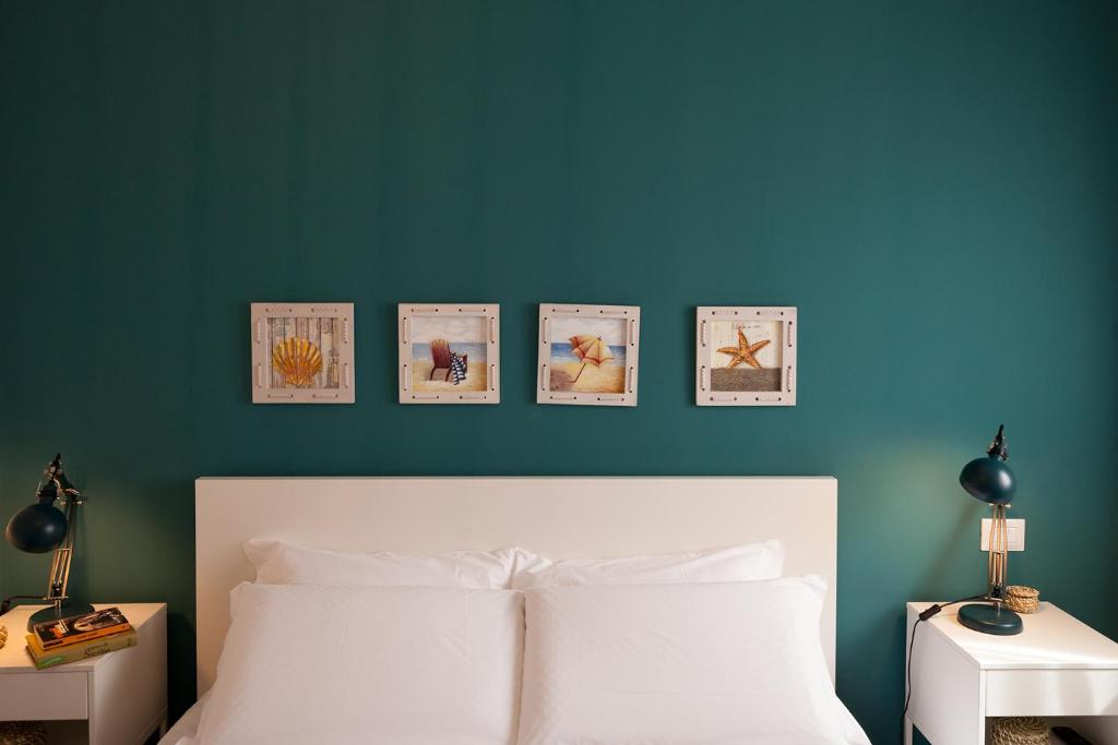Posteľ alebo postele v izbe v ubytovaní Nerissa suites&rooms
