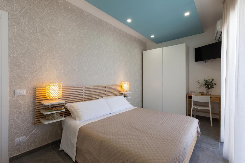 Posteľ alebo postele v izbe v ubytovaní Nerissa suites&rooms