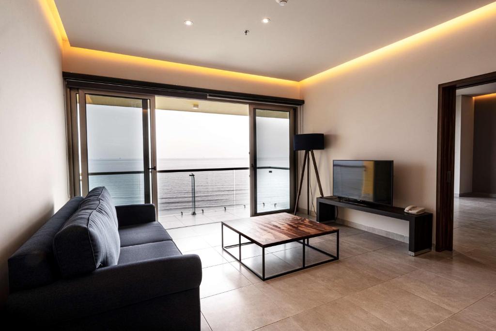 TV a/nebo společenská místnost v ubytování Best Western Plus Riviera Veracruz