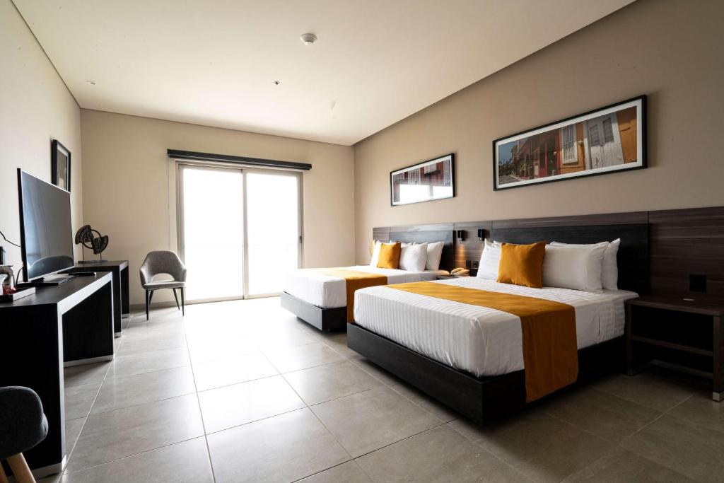 Postel nebo postele na pokoji v ubytování Best Western Plus Riviera Veracruz