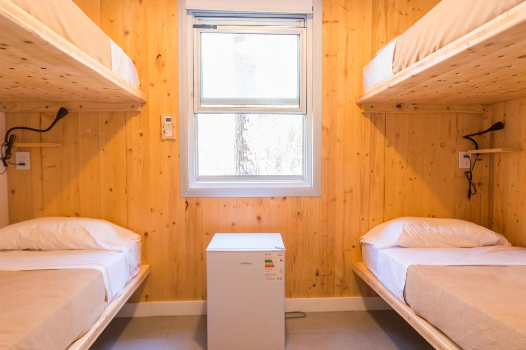 Postel nebo postele na pokoji v ubytování Wanderlust José Ignacio