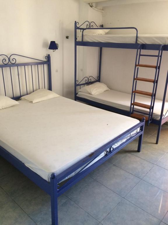 Postel nebo postele na pokoji v ubytování EL GRECO