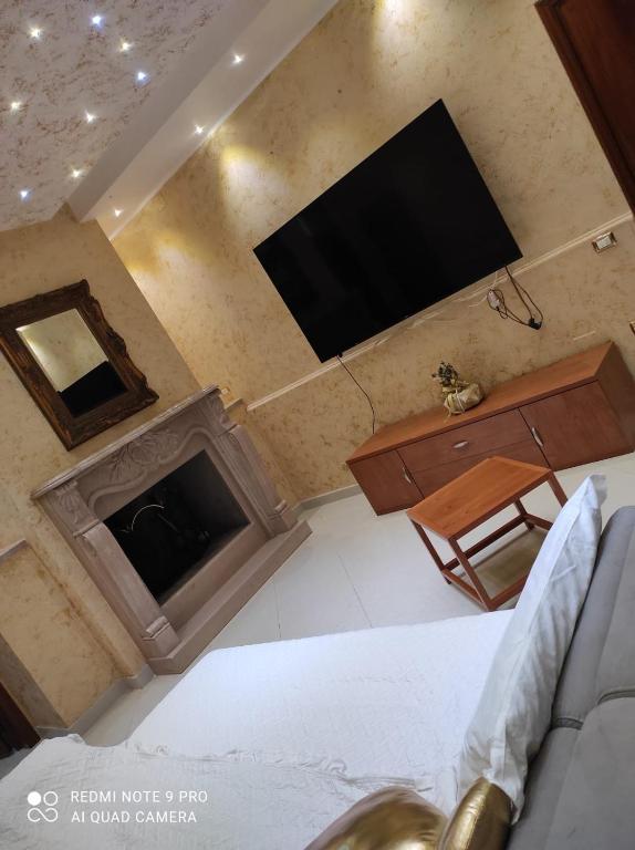 TV a/nebo společenská místnost v ubytování Hotel Paladini