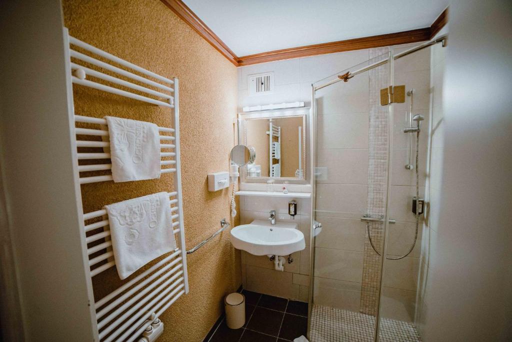 Koupelna v ubytování Garten-Hotel Ochensberger