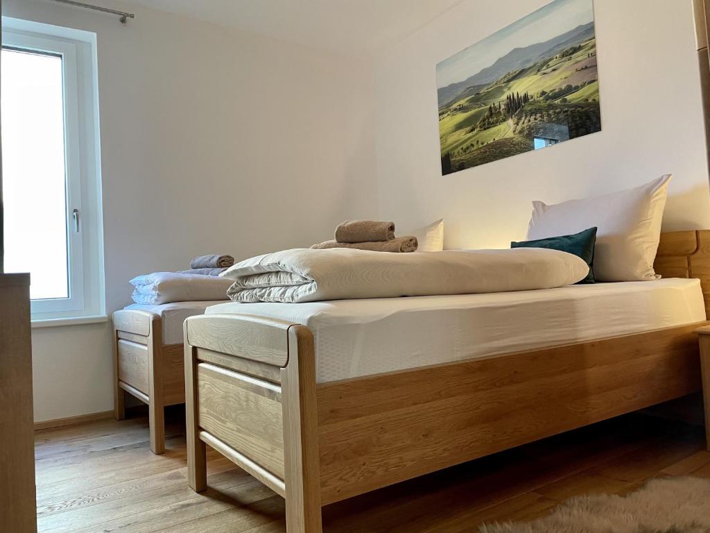 Postel nebo postele na pokoji v ubytování Panorama Lodge Mountainview 208