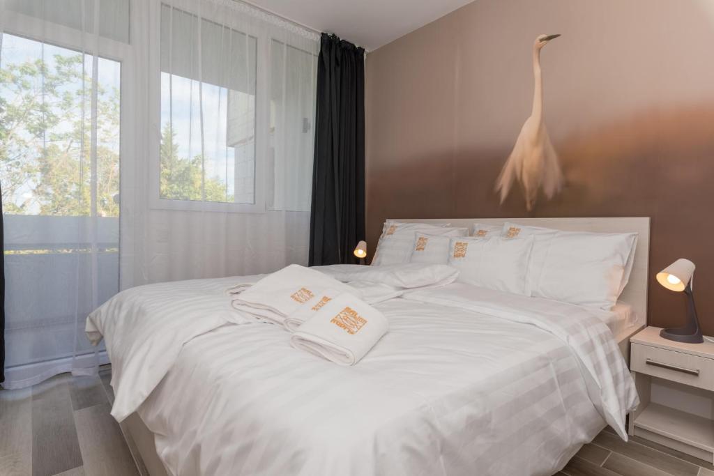 Posteľ alebo postele v izbe v ubytovaní Balinn rooms