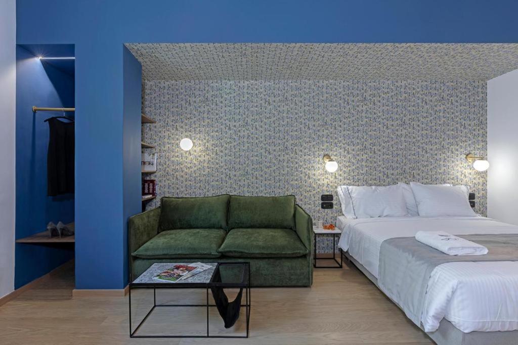 Postel nebo postele na pokoji v ubytování Acro Urban Suites