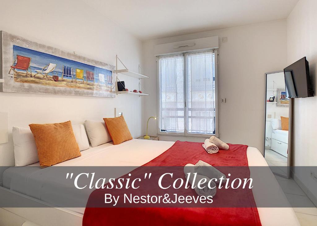 ニースにあるNestor&Jeeves - PALAIS LIBERTE - Hyper center - Shopping area - Close seaのベッドルーム1室(赤毛布付きの大型ベッド1台付)