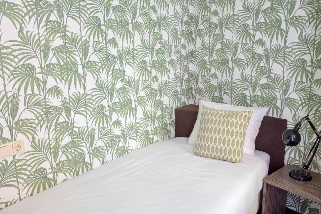 Postel nebo postele na pokoji v ubytování Hotel Sebel