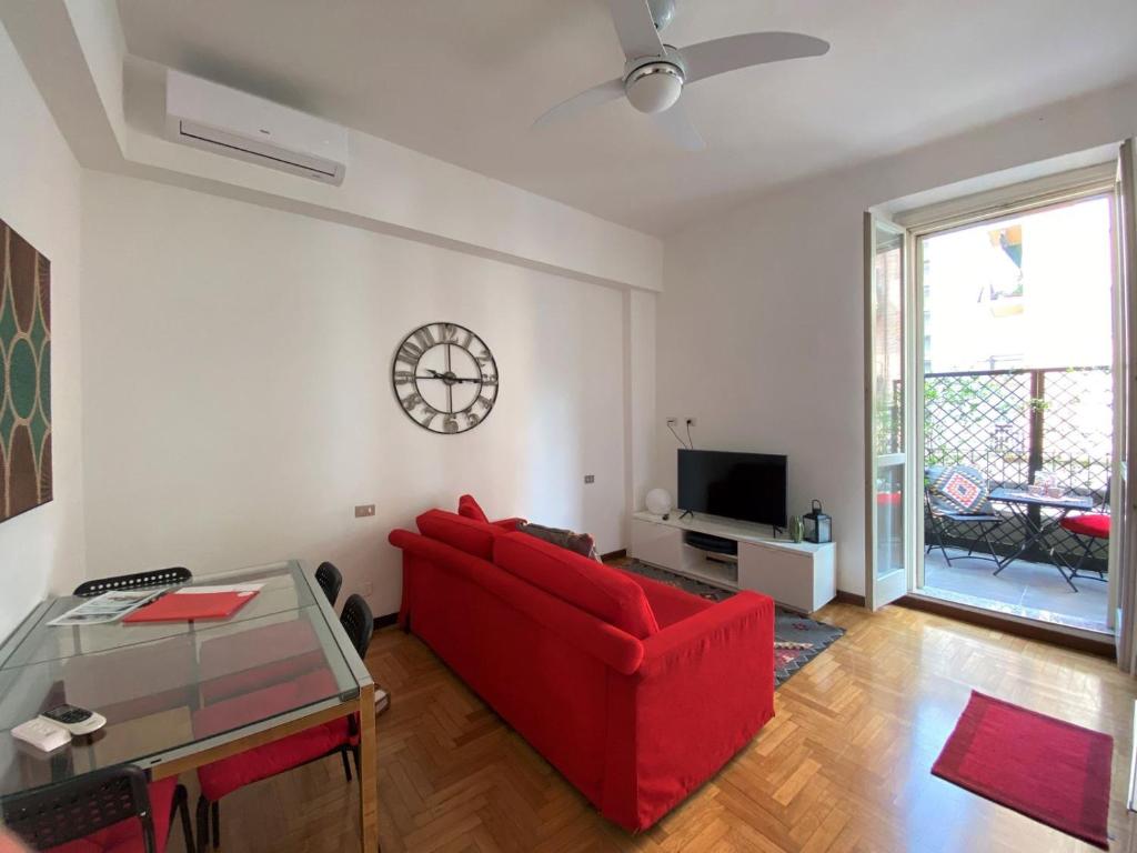 Televízia a/alebo spoločenská miestnosť v ubytovaní Via Benzi Apartment Como