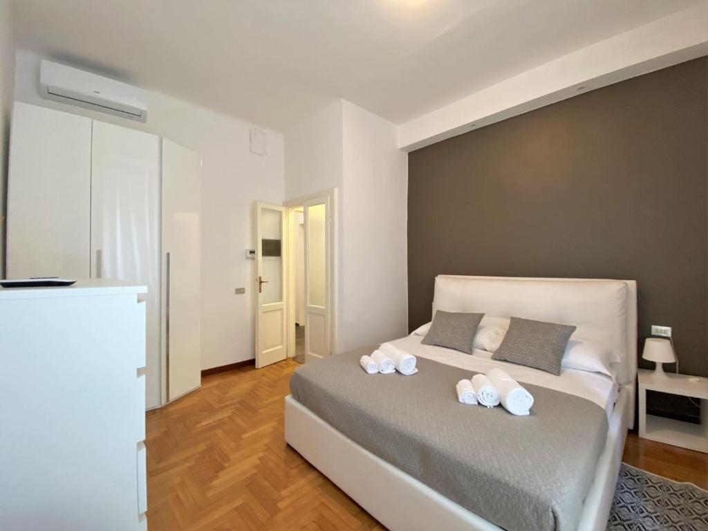Posteľ alebo postele v izbe v ubytovaní Via Benzi Apartment Como