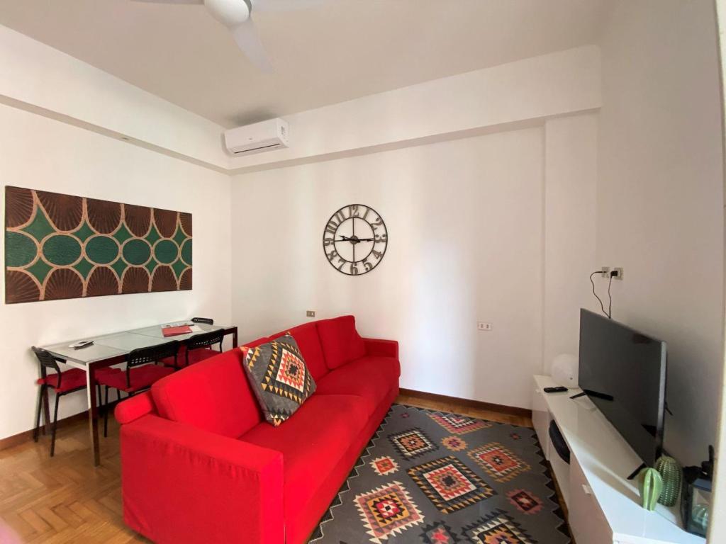 Televízia a/alebo spoločenská miestnosť v ubytovaní Via Benzi Apartment Como