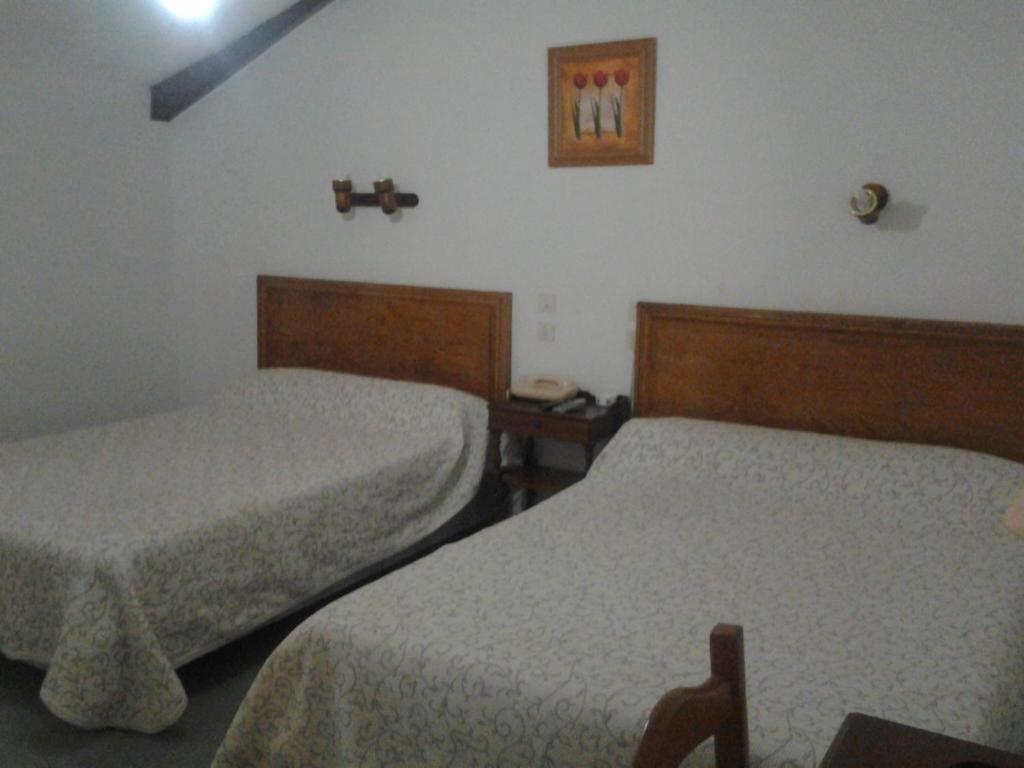 Postel nebo postele na pokoji v ubytování Le Ranfort Chambres d'Hôtes