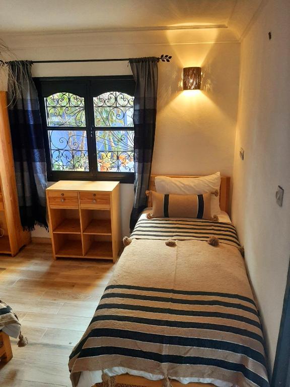 Postel nebo postele na pokoji v ubytování Desert Home Essaouira