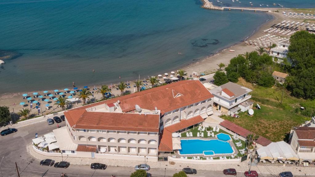 an aerial view of a resort and the beach at Aphrodite Beachfront Hotel by Konnect, Roda in Roda