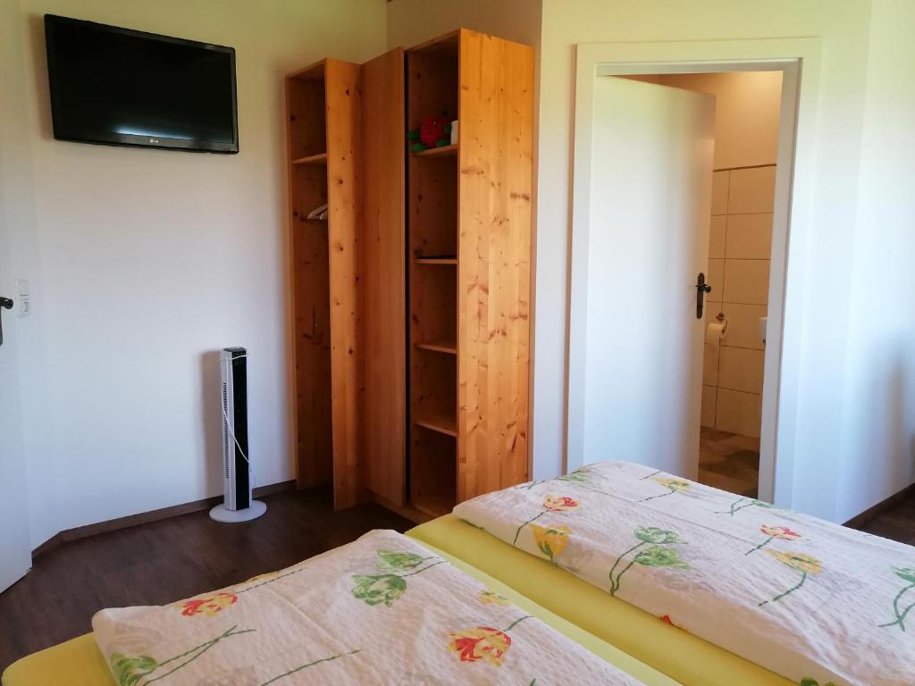 Postel nebo postele na pokoji v ubytování Peterseil's Radl Zimmer