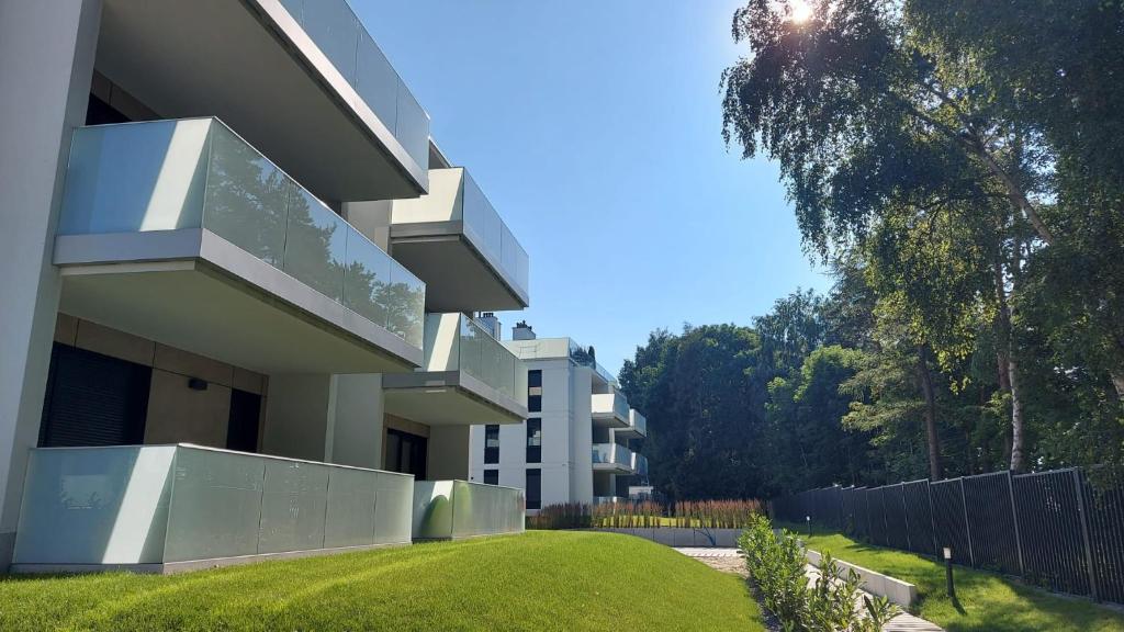 Vonkajšia záhrada v ubytovaní Apartament Mare , Rewal ulica Szczecińska 21 Apartament nr 3