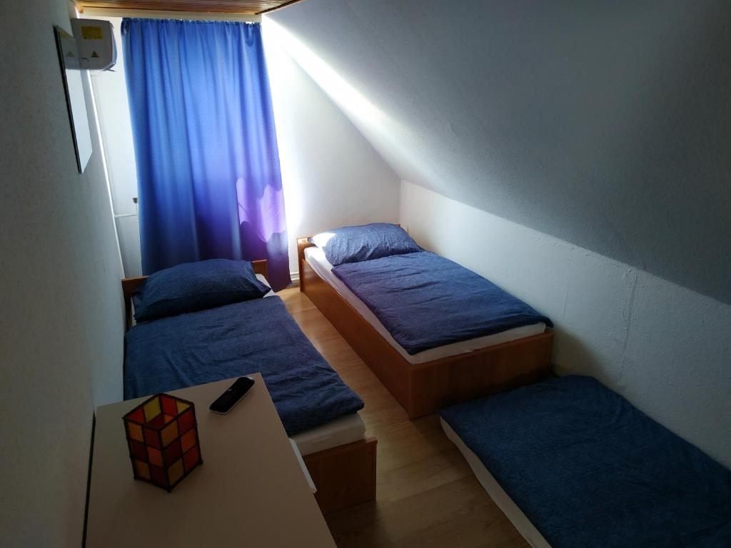 Aranyharmat Apartman - Desván