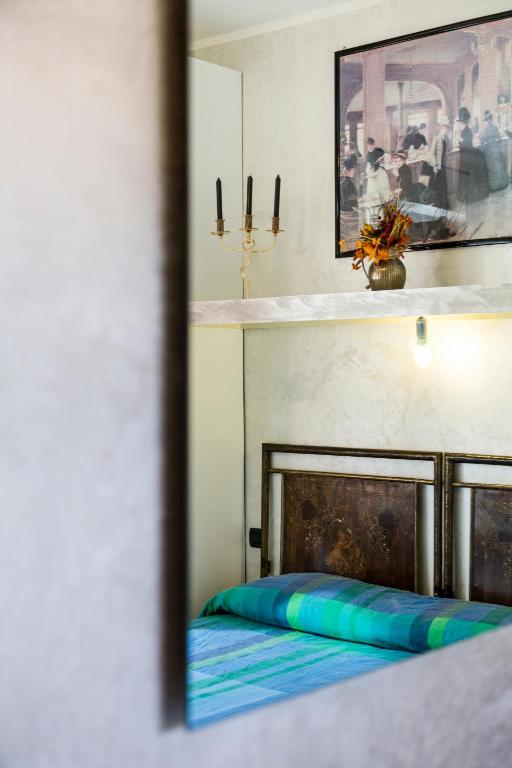 Postel nebo postele na pokoji v ubytování Albergo Centrale Scanno