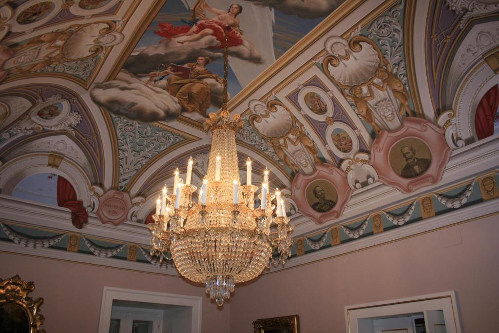 a chandelier hanging from the ceiling of a building at Palazzo Franza Musarò in Ugento