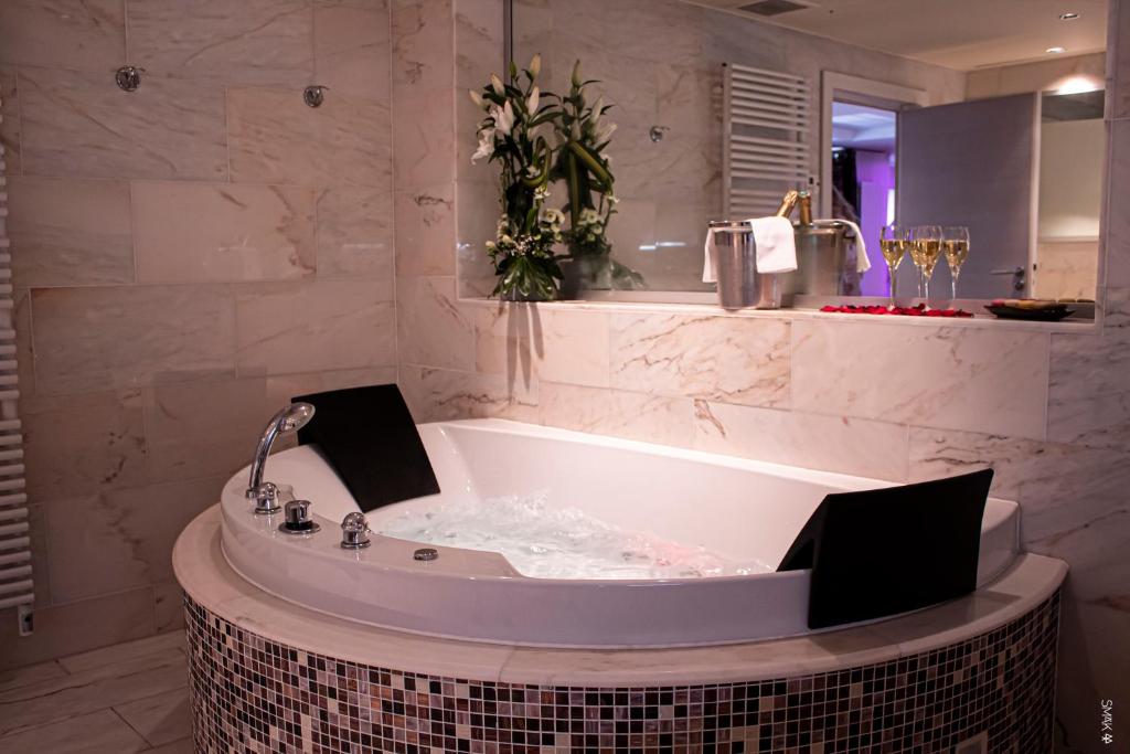 Koupelna v ubytování Hotel L'Europe