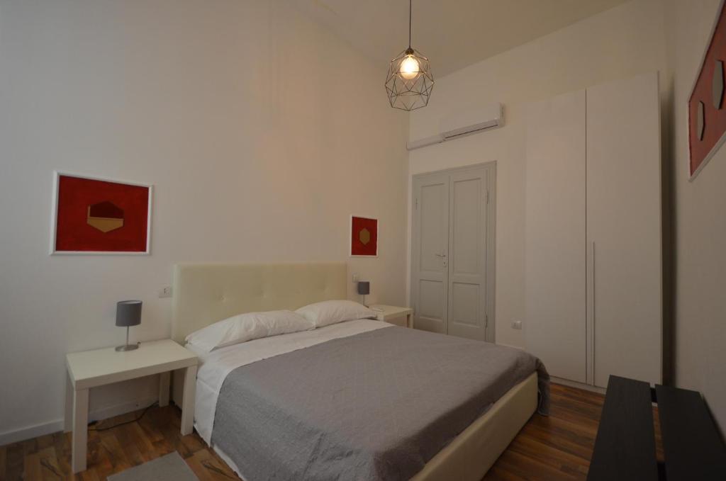 Łóżko lub łóżka w pokoju w obiekcie Varennahouse