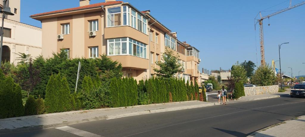 a building sitting on the side of a street at Black Sea View - Luxory apartment by the sea in Burgas City