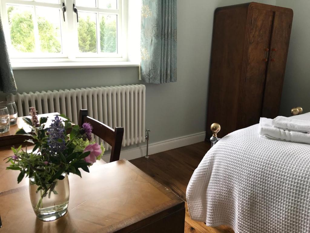 Postel nebo postele na pokoji v ubytování Andresna House