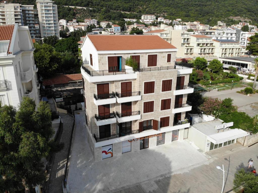 an aerial view of a building in a city at Mar Azul Apartments Petrovac in Petrovac na Moru