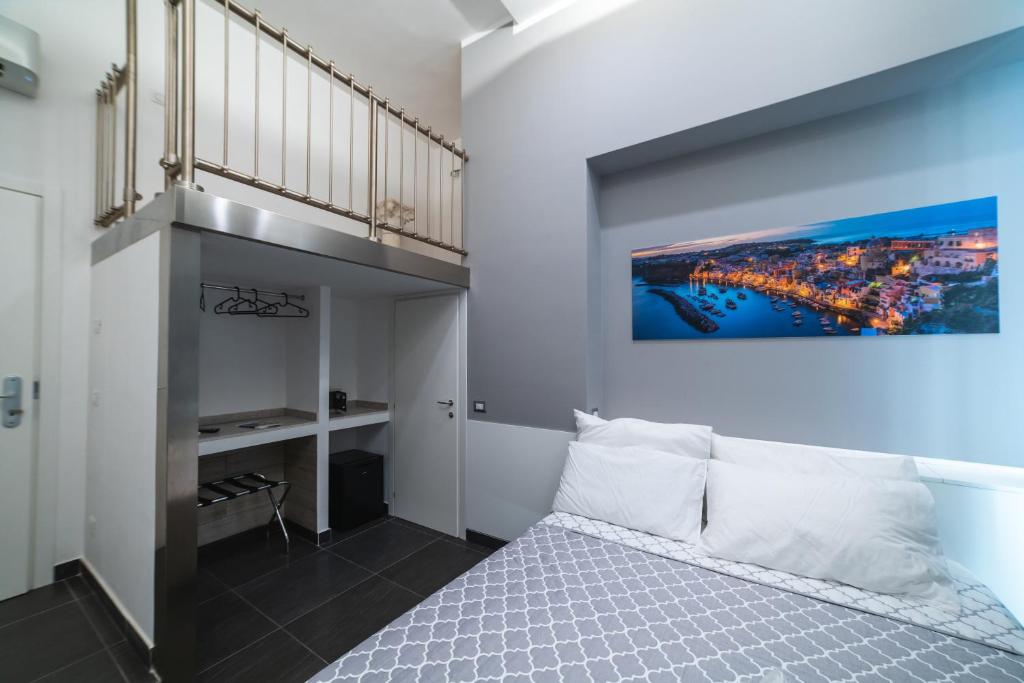 Postel nebo postele na pokoji v ubytování B&b Onda Napoli