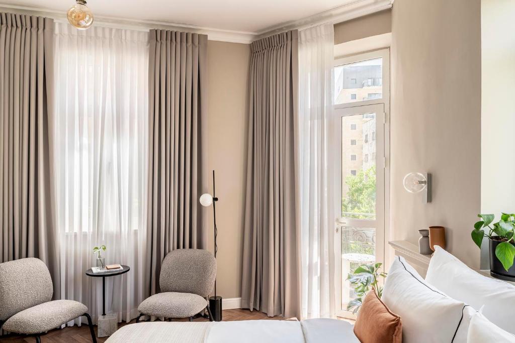 Posezení v ubytování Hotel Noel - A Boutique Experience by Albi Collection