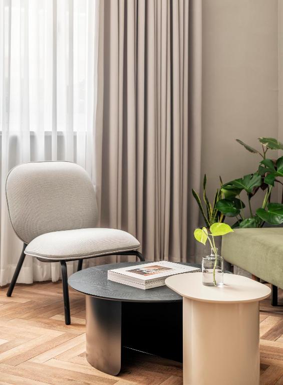 Posezení v ubytování Hotel Noel - A Boutique Experience by Albi Collection