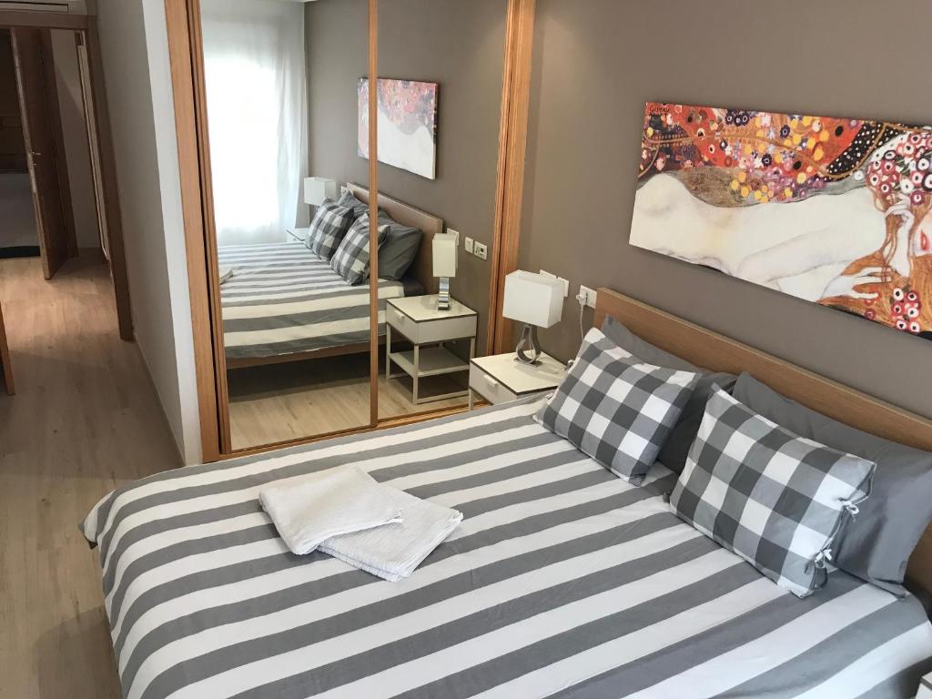 Posteľ alebo postele v izbe v ubytovaní Casa City