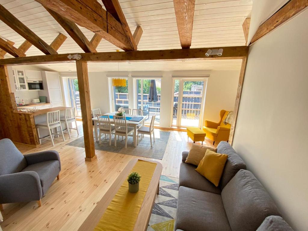 a living room with a couch and a table at Eva in Liepāja