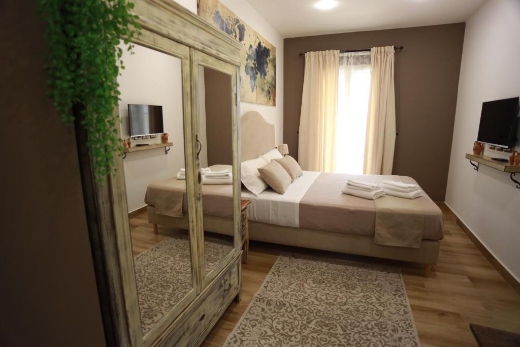 Un ou plusieurs lits dans un hébergement de l'établissement B&B Sant'Agata Patrona