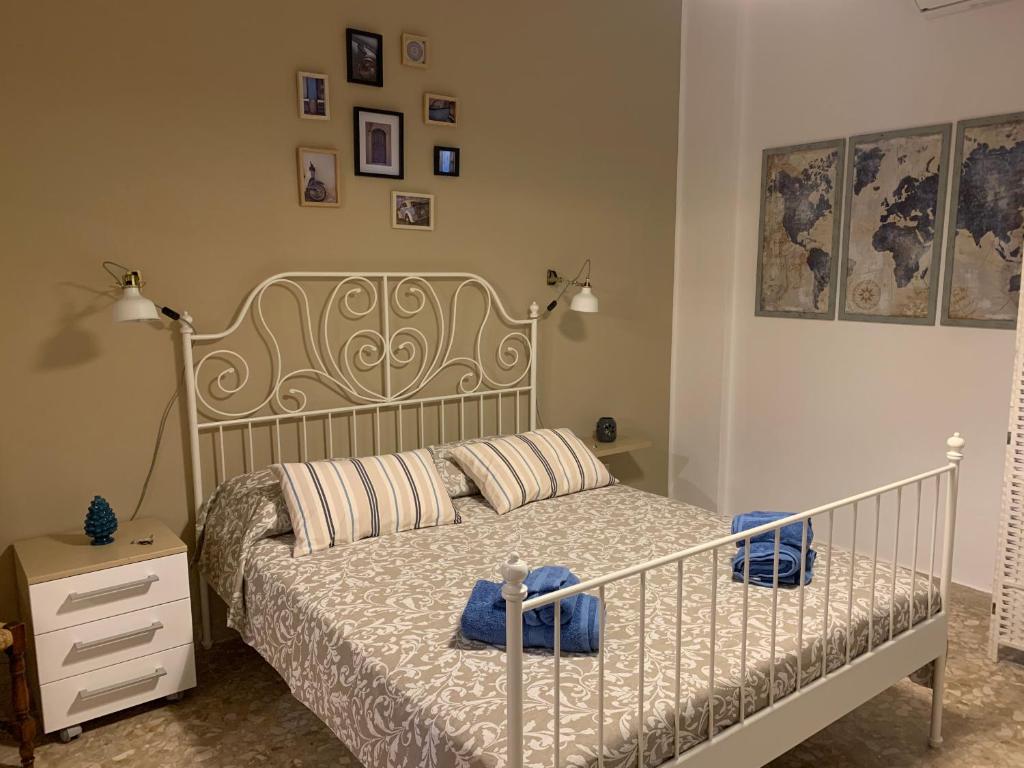 Postel nebo postele na pokoji v ubytování B&B Fiorisol