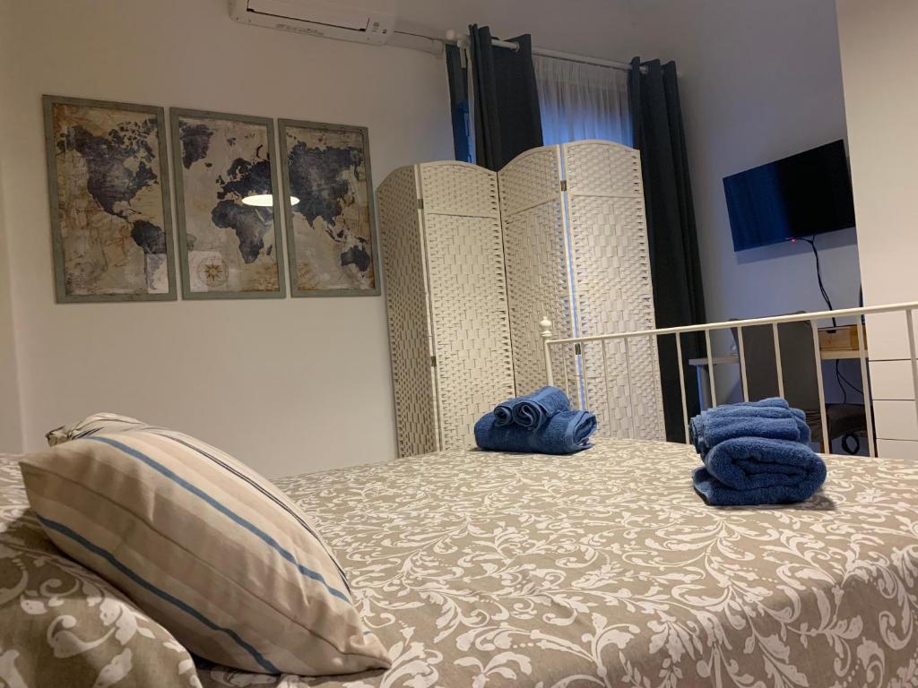 Postel nebo postele na pokoji v ubytování B&B Fiorisol