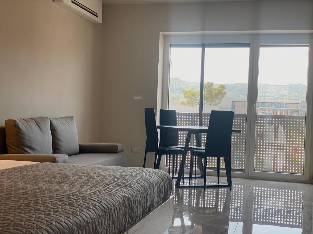 Postel nebo postele na pokoji v ubytování Rooms and Apartments Lisjak