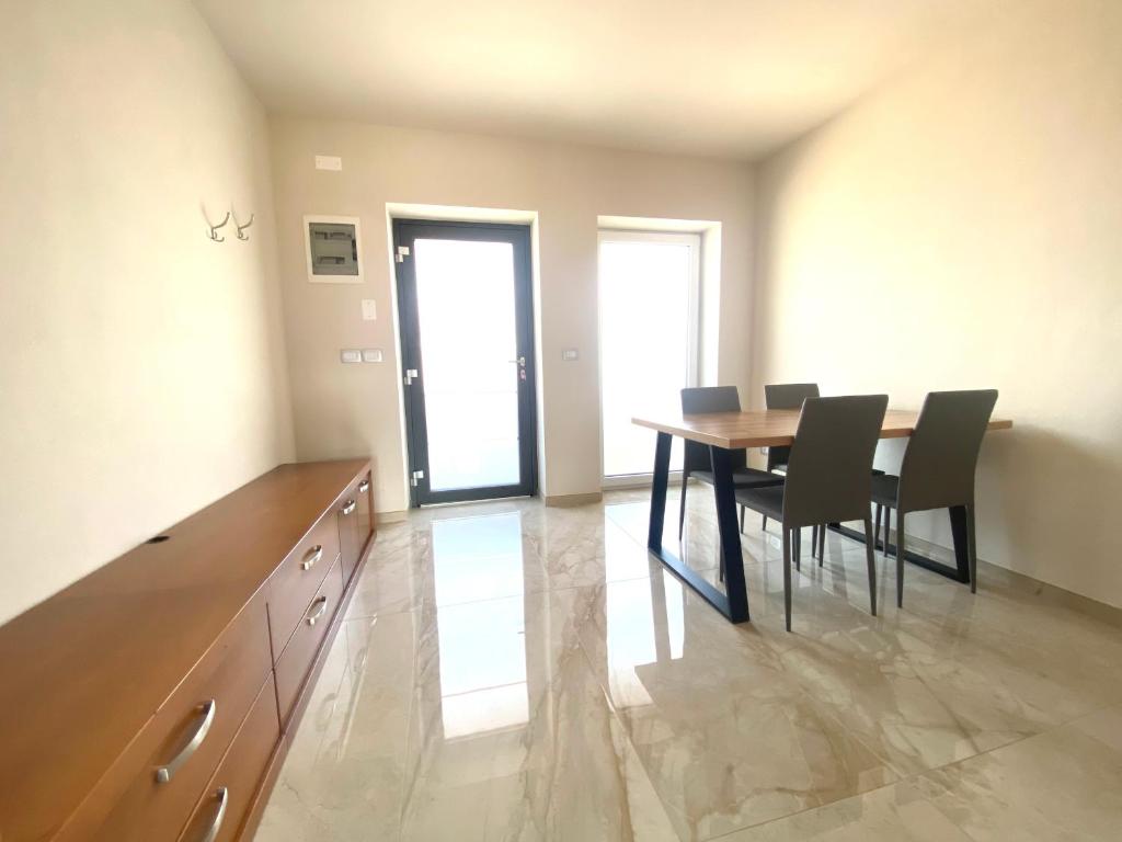 Posezení v ubytování Rooms and Apartments Lisjak