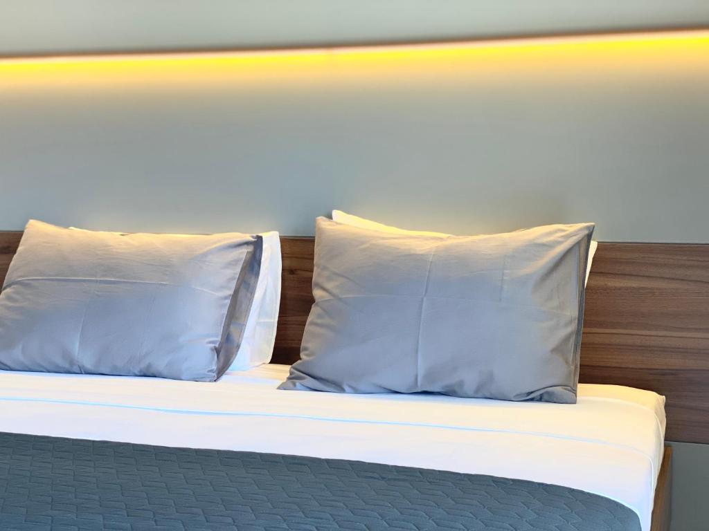 Postel nebo postele na pokoji v ubytování Rooms and Apartments Lisjak