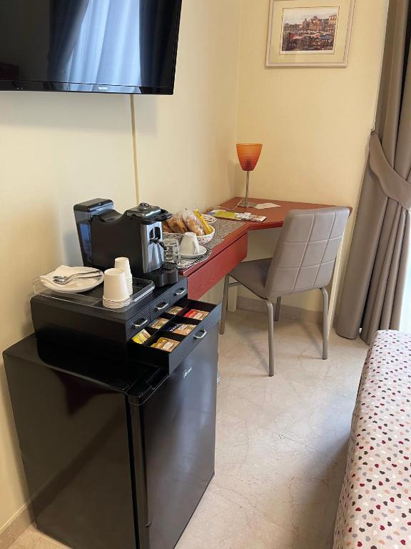 Příslušenství pro přípravu čaje a kávy v ubytování B&B Ponte Capograssi