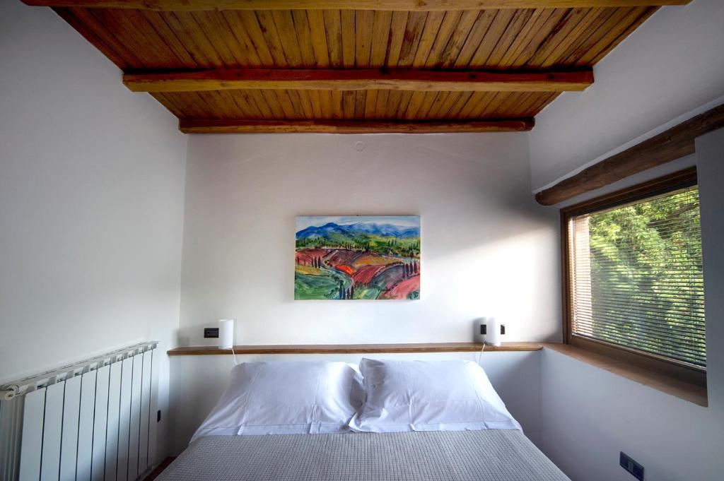 Postel nebo postele na pokoji v ubytování Albergo Fontanelle