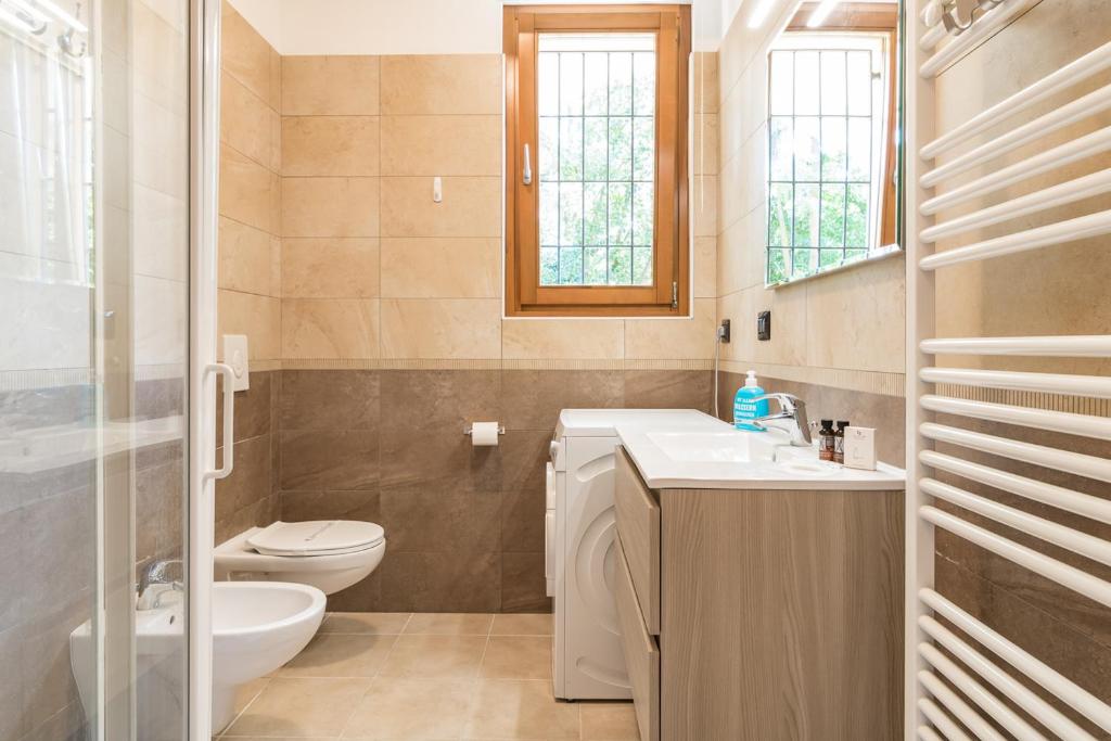 Koupelna v ubytování Apartment Gli Ulivi 4 - Tremezzina