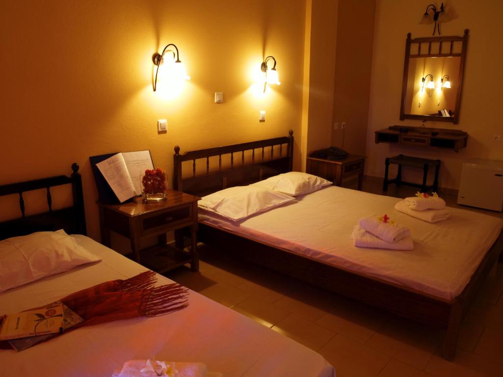 Posteľ alebo postele v izbe v ubytovaní Kissamos Hotel