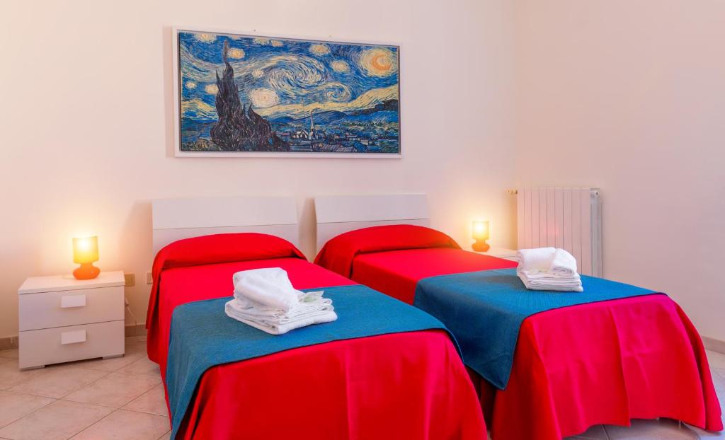 Postel nebo postele na pokoji v ubytování B&B Torre Lauro