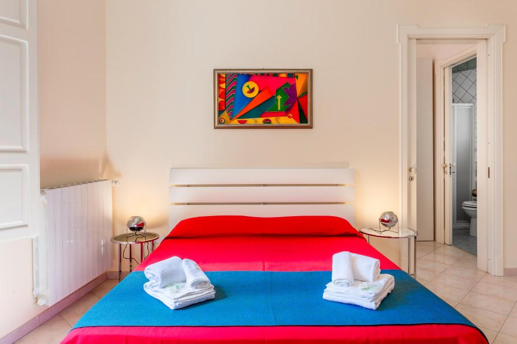 Postel nebo postele na pokoji v ubytování B&B Torre Lauro