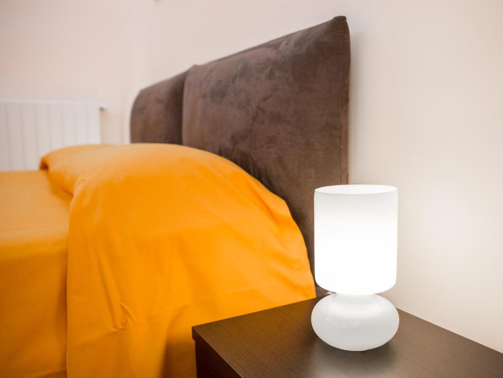 Postel nebo postele na pokoji v ubytování B&B Torre Lauro