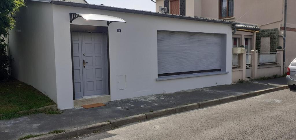 Charmante petite maison - Studio De Famille