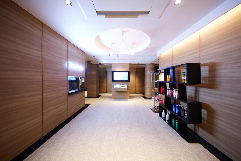 TV a/nebo společenská místnost v ubytování HOTEL Kslit Adult Only