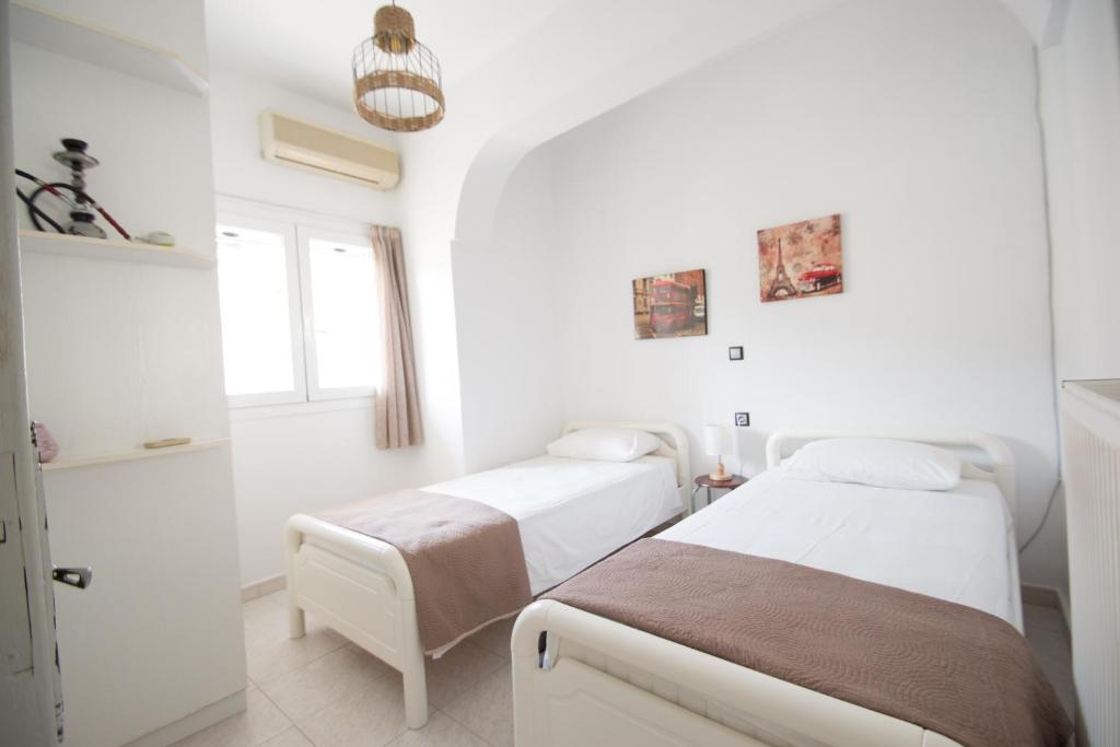 Posteľ alebo postele v izbe v ubytovaní Ionian View Apartment